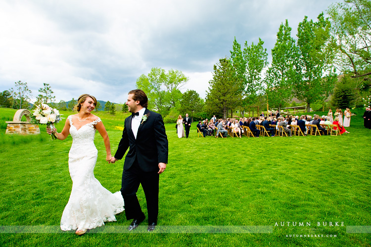 spruce mountain ranch wedding ceremony bride and groom just married colorado joy