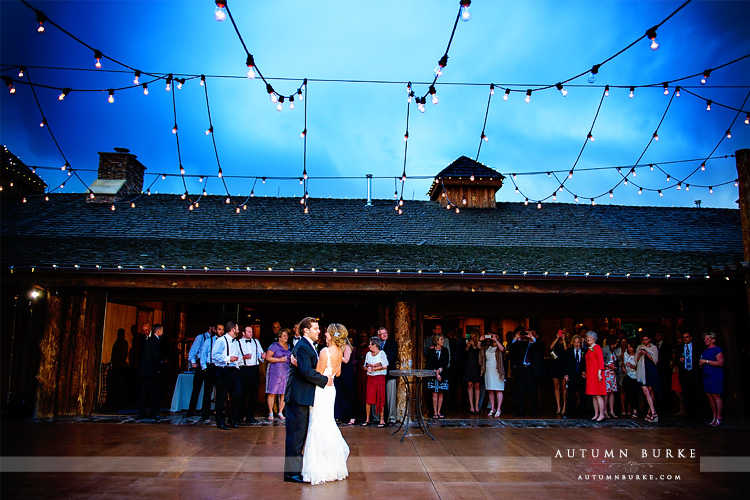 spruce mountain ranch wedding reception courtyard first dance market lights