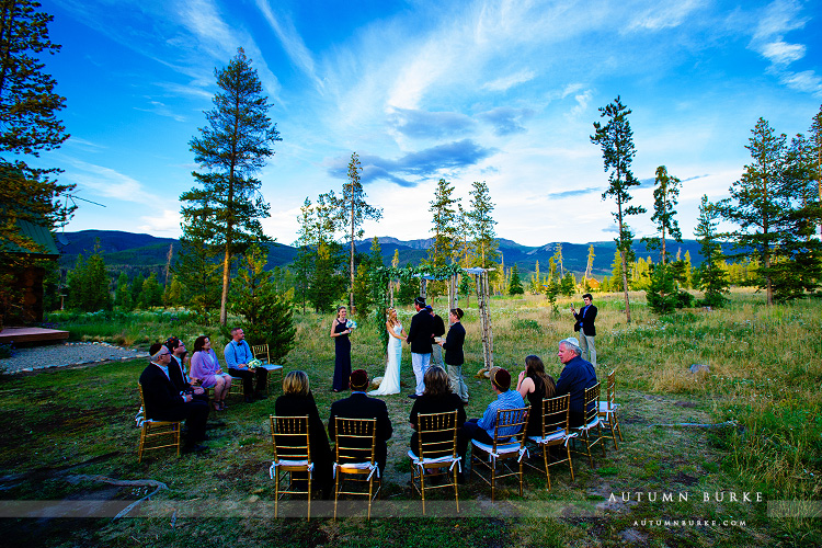 first look wild horse inn colorado mountain wedding ceremony chuppah tabernash winter park wildflowers jewish ceremony intimate