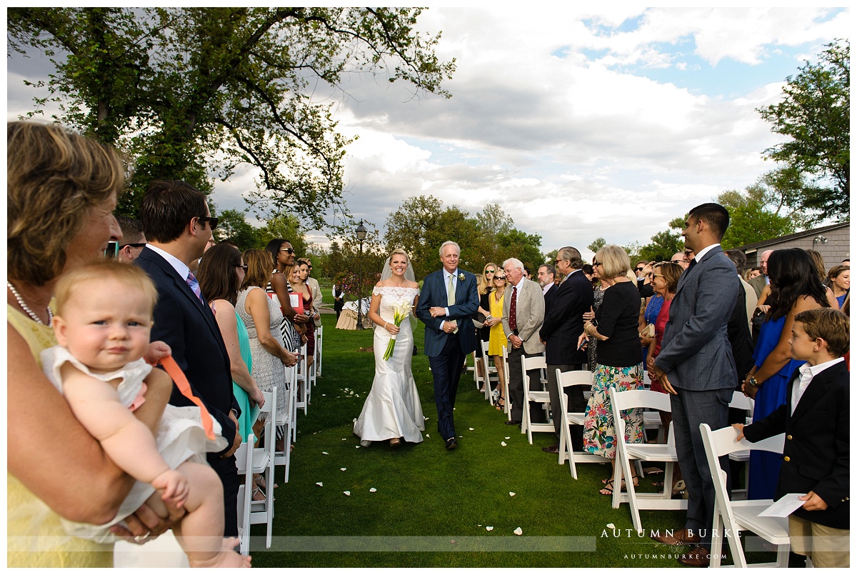 denver country club wedding ceremony bride walking down the aisle