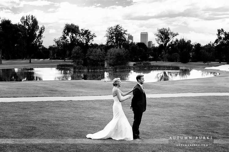 country club colorado denver cherry creek wedding bride and groom first look golf course denver skyline lake bw