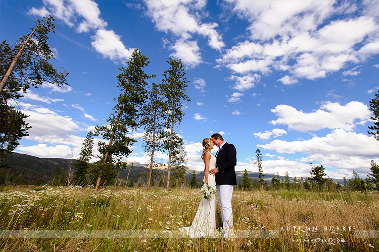 wild horse inn winter park wedding bride and groom mountains field rustic colorado