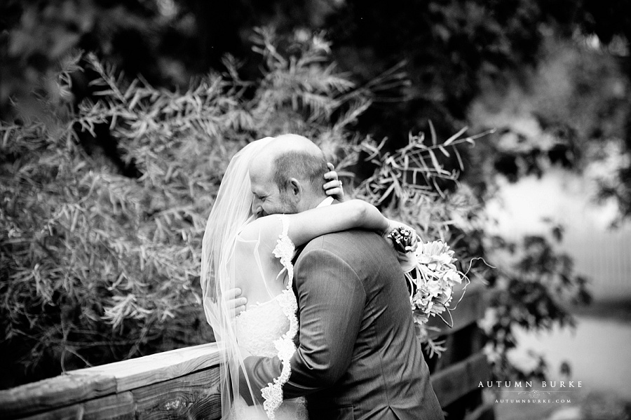 bride and groom embrace colorado wedding chatfield botanic gardens