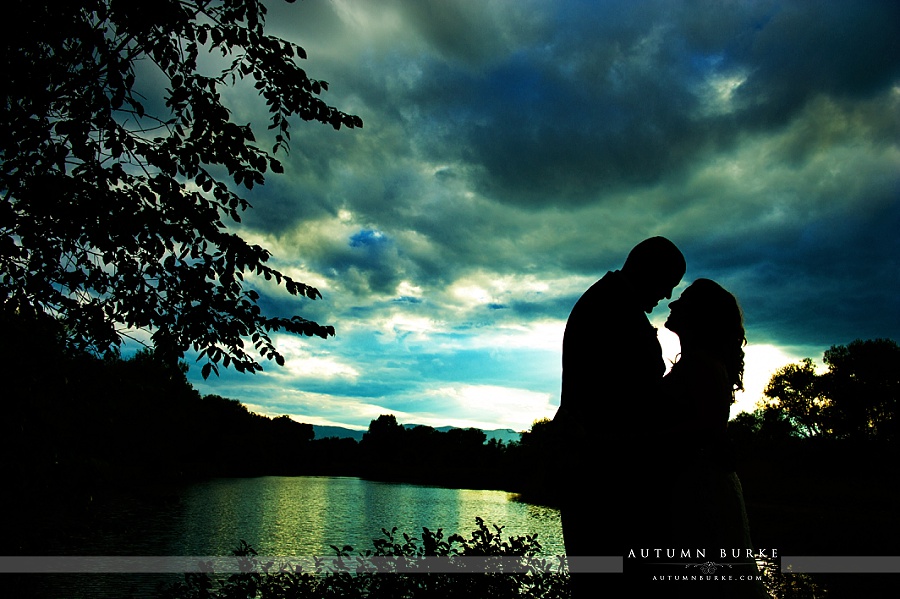 denver colorado wedding bride and groom portrait sunset silhouette lake