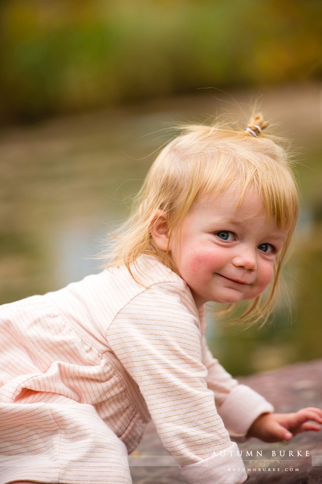 family portraits colorado fall autumn leaves children kids playful