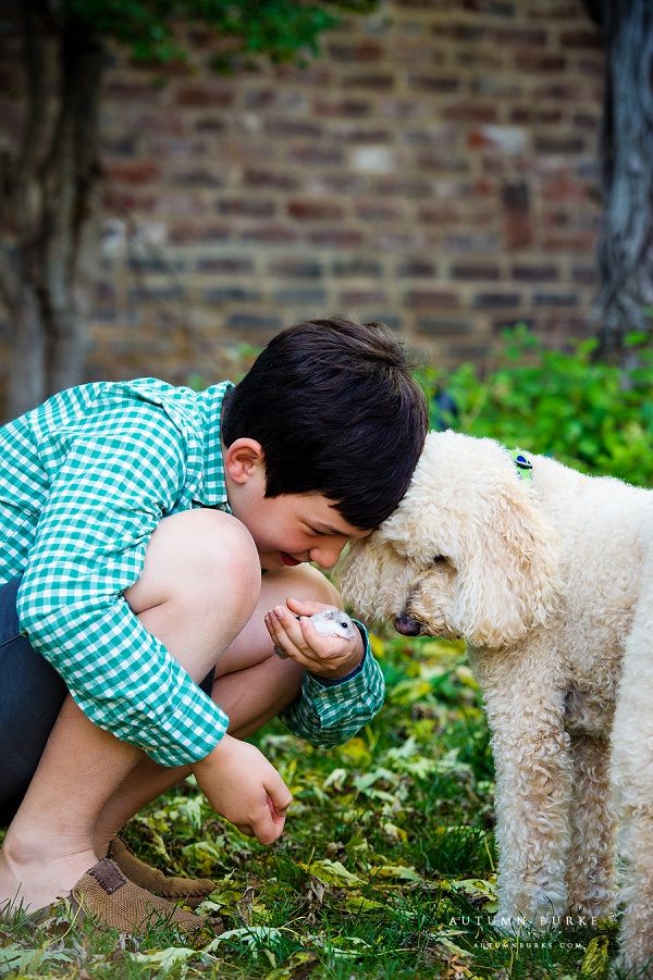 colorado lifestyle portrait boy and gerbil and dog family pets