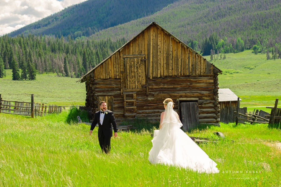 keystone ranch wedding bride and groom first look rustic barn