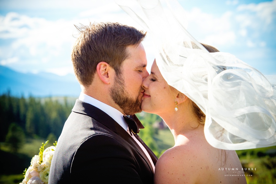 bride and groom closeup with veil colorado wedding