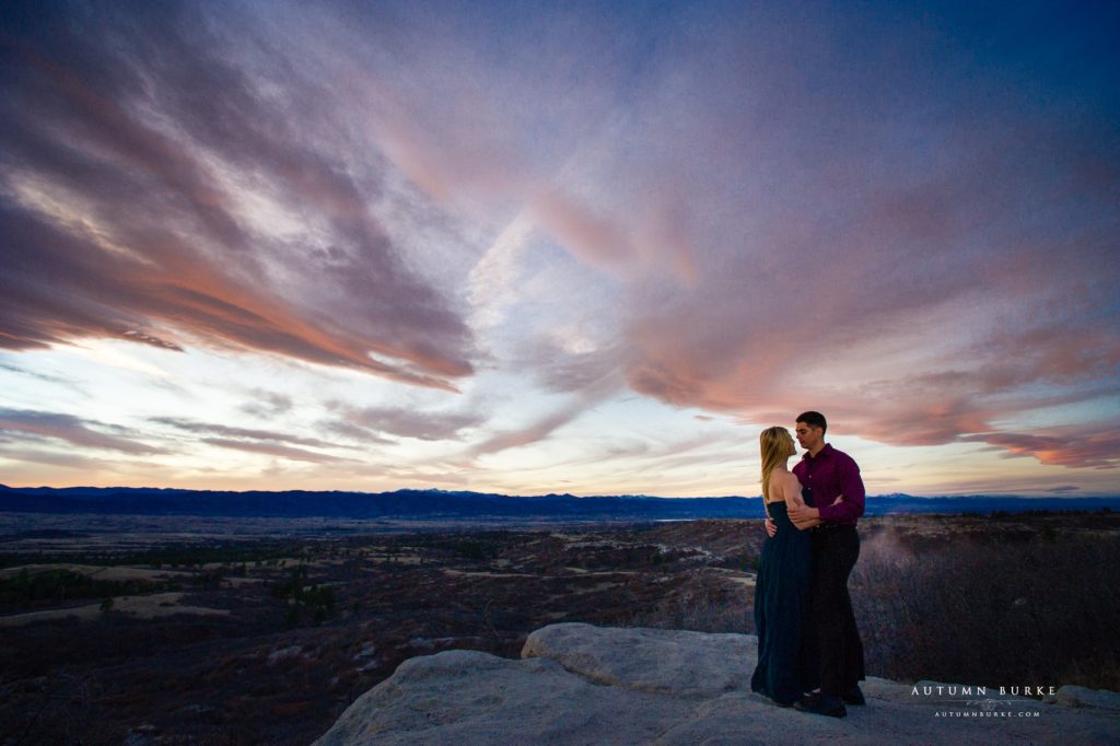 daniels park colorado engagement session dramatic sky mountains